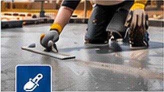 Worker finishing a concrete surface